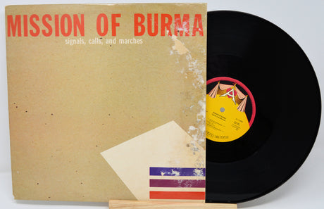 Vinyl record and cover with 'Mission of Burma' album on a white background