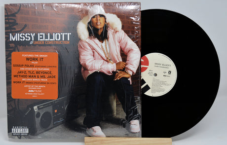 Missy Elliott Under Construction vinyl LP front cover featuring Missy in a pink fur jacket