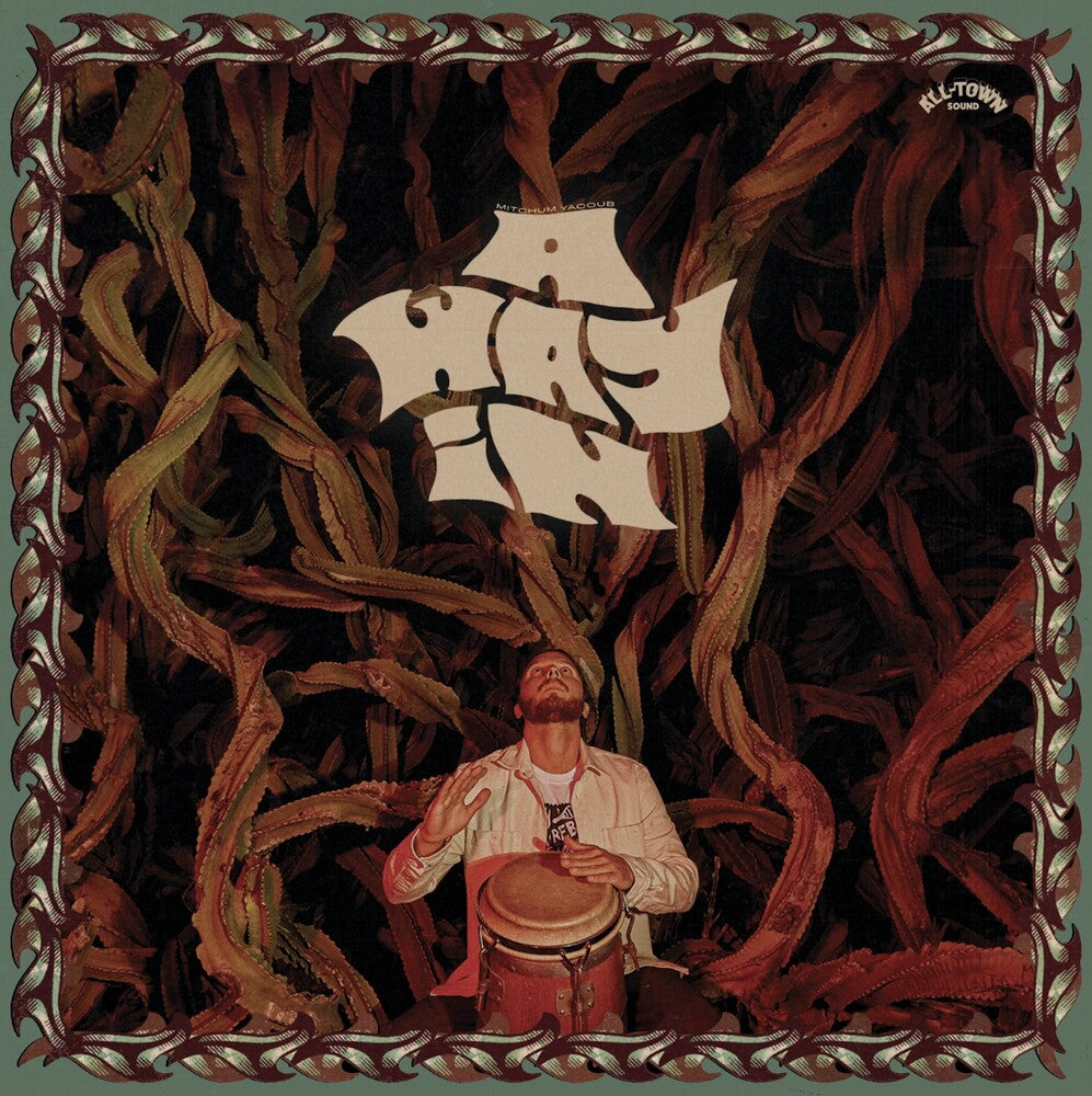Man playing a drum with a ship in the sky, surrounded by intricate patterns.
