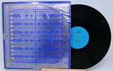Vinyl record with blue label and cover on a white background