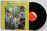 Vinyl record and cover with 'More of the Monkees' on a white background