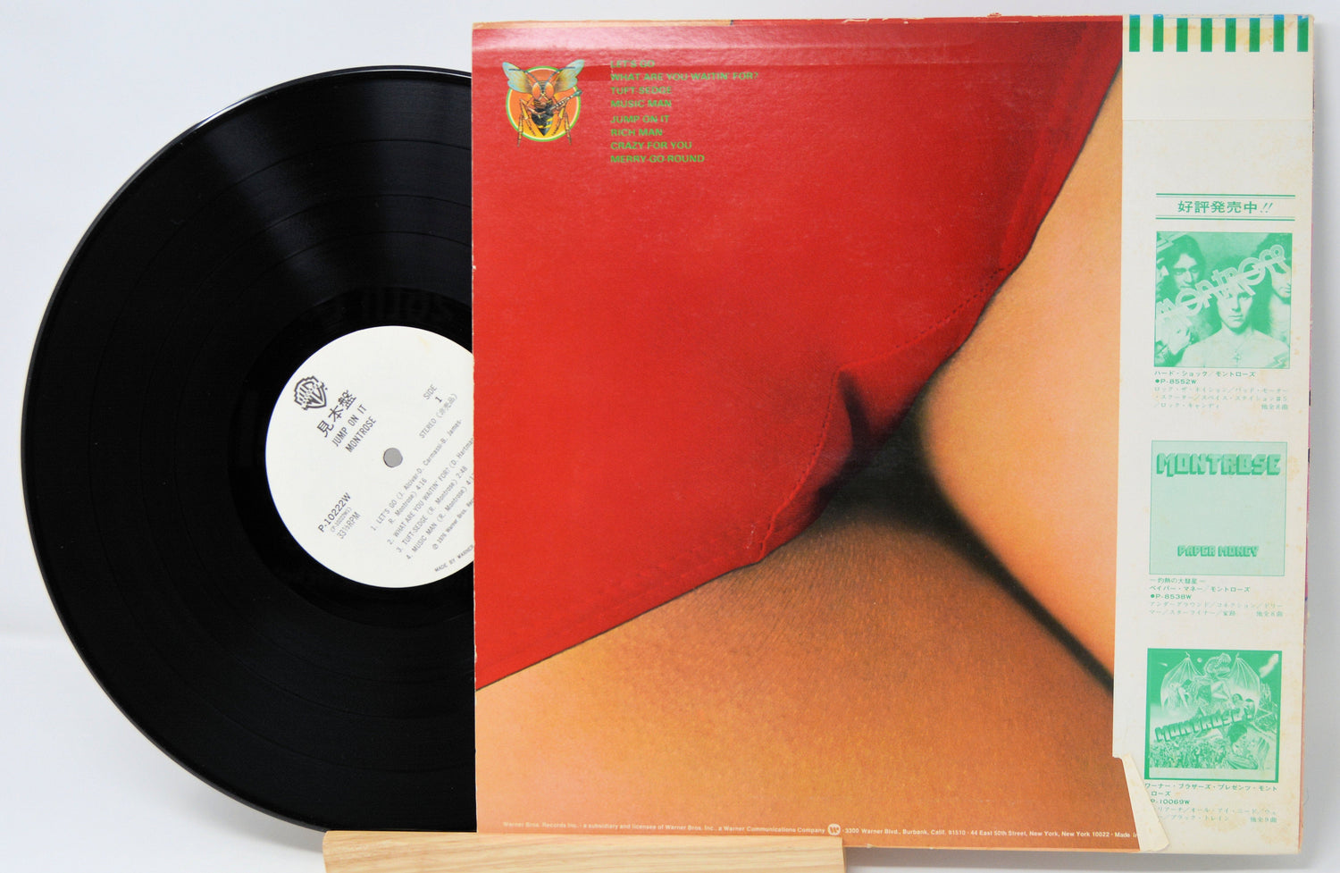 Back cover of Montrose Jump On It Japanese vinyl LP with record partially displayed and red swimsuit artwork