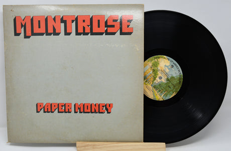 Vinyl record and cover with 'Montrose Paper Money' on a white background