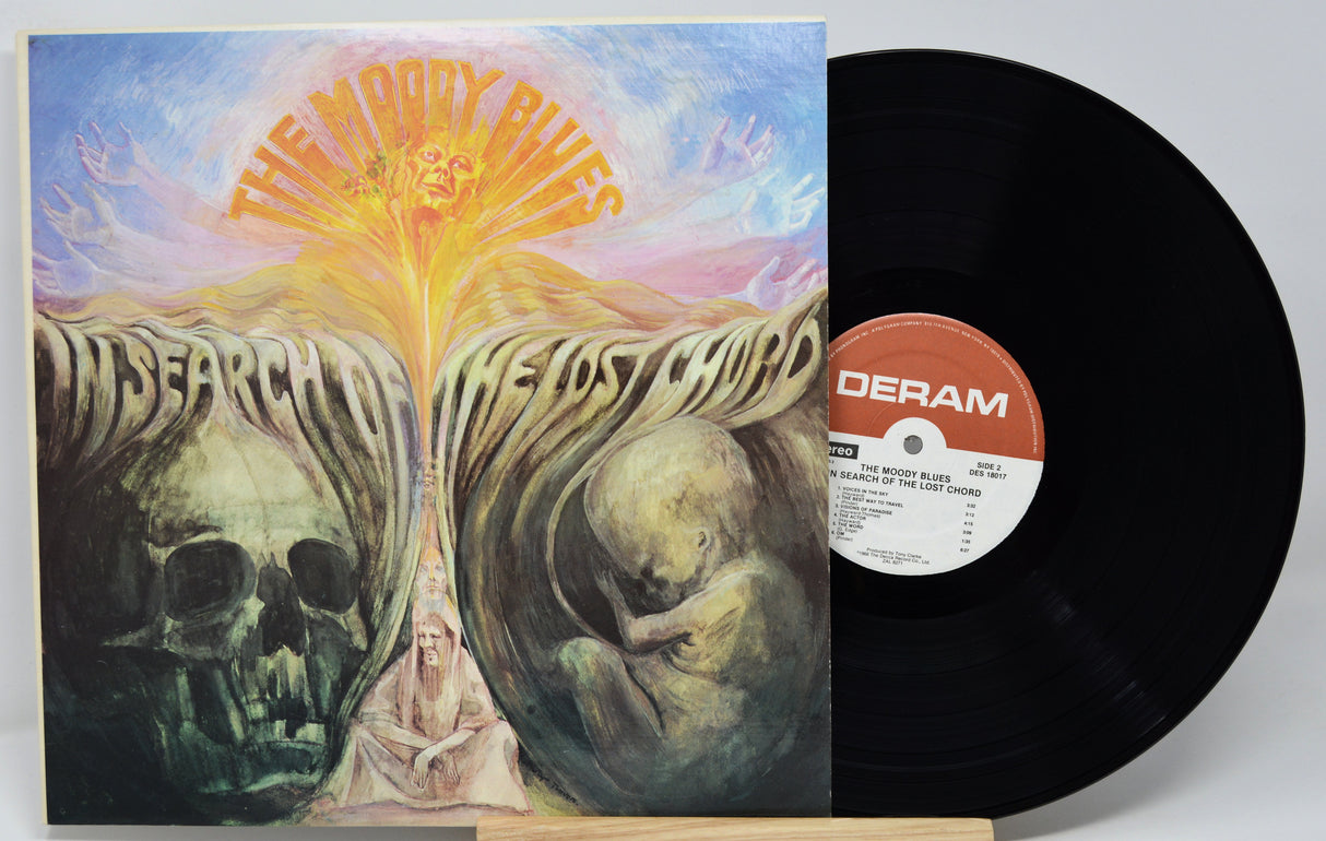 Vinyl record with a colorful album cover featuring artistic design and 'DERAM' label.