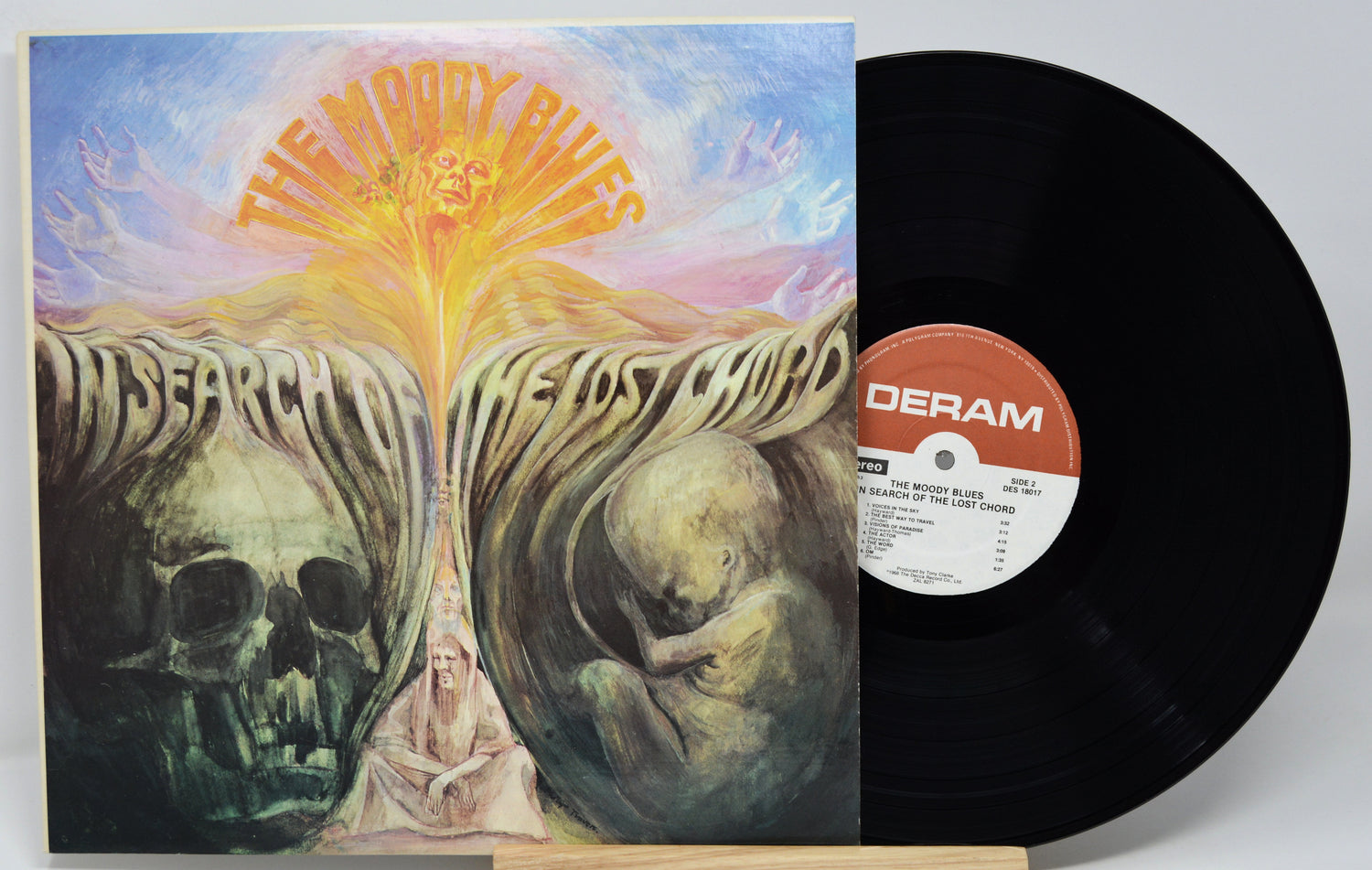 Vinyl record with a colorful album cover featuring artistic design and 'DERAM' label.