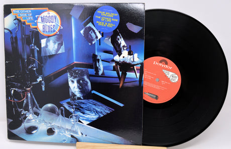 Vinyl record with a colorful cover featuring scientific imagery and a Powell Records label.