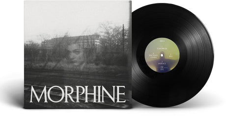 Morphine vinyl record album shown with the black LP partially pulled from the sleeve, which features a black-and-white moody outdoor portrait and the band name MORPHINE in large white letters.