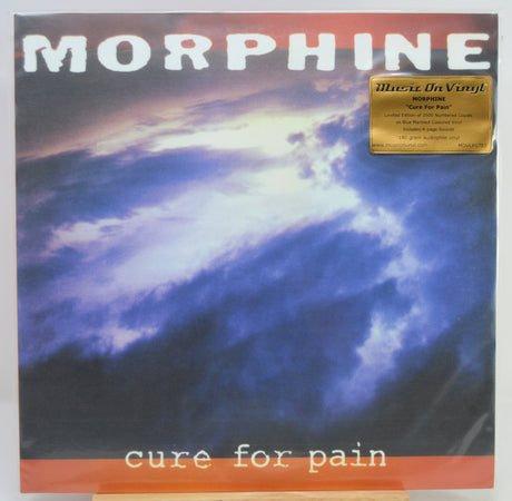 Morphine - 'cure for pain' vinyl record album cover, featuring a dramatic blue and white storm cloud design with orange bands at the top and bottom and a gold 'Music On Vinyl' sticker.