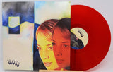 Front cover of Moss by Maya Hawke with red vinyl, featuring double exposure portrait artwork