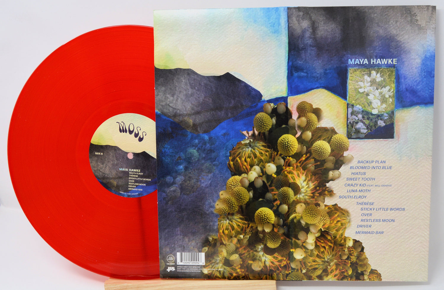 Moss by Maya Hawke red vinyl LP with abstract floral album art and visible track list