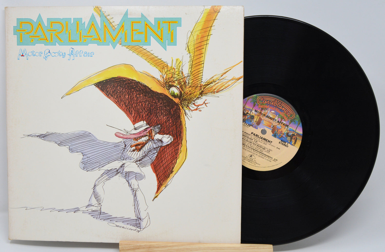 Front cover of Parliament Motor Booty Affair LP, featuring cartoon aquatic bird and funky character