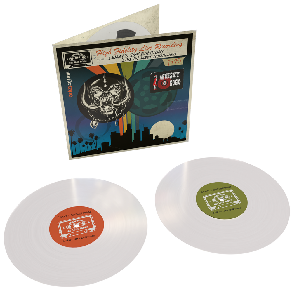 Vinyl records with colorful labels and a record cover featuring a skull and cityscape.