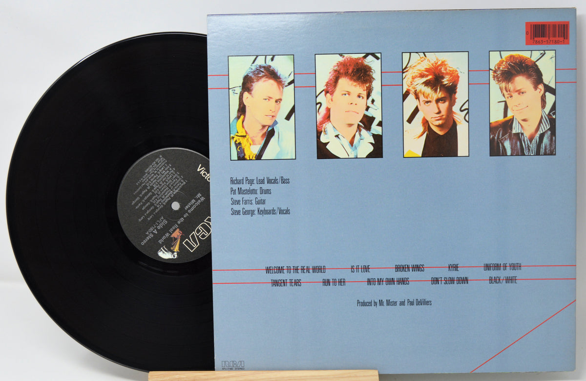 Vinyl record with a blue cover featuring four portraits and a white background