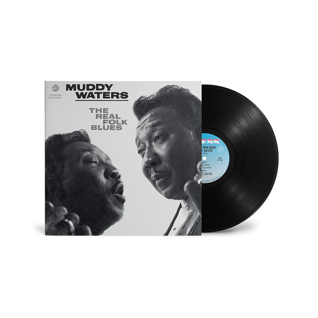 Vinyl record with cover featuring Muddy Waters and text 'The Real Folk Blues' on a white background.