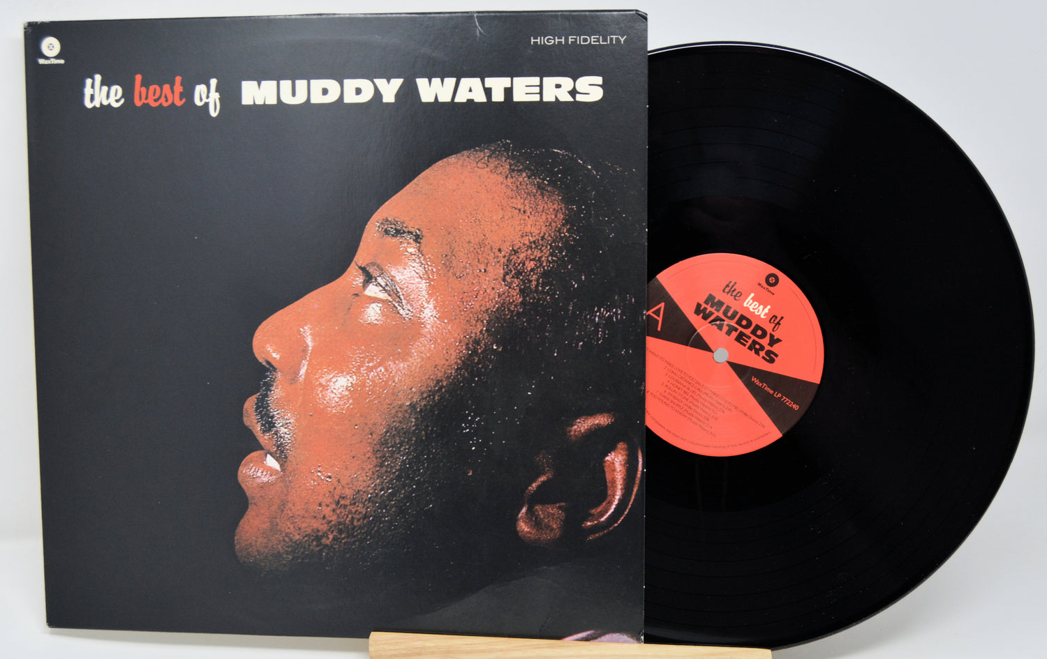 Vinyl record and cover titled 'The Best of Muddy Waters' on a white background
