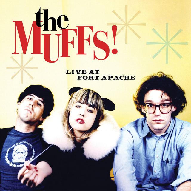 Album cover for 'The Muffs! Live at Fort Apache' featuring three band members against a yellow background with star designs.