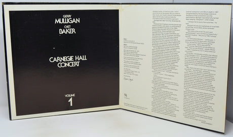 An open book or program booklet showing the front cover on the left with a black background and white text reading 'Gerry Mulligan and Bart Baker Carnegie Hall Concert Volume 1,' and printed text pages on the right.
