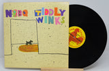 Vinyl record by NRBQ titled Tiddly Winks showing a drawing of a small dog in a room.