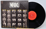 NRBQ vinyl record album with the black LP partially pulled from the sleeve, showing the front cover artwork and a red center label.