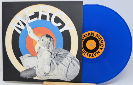 Vinyl record with a blue disc and cover featuring artistic design and text.