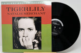 Tigerlily - Natalie Merchant original master record vinyl LP, showing the album cover with a portrait and the black vinyl record partially pulled out.