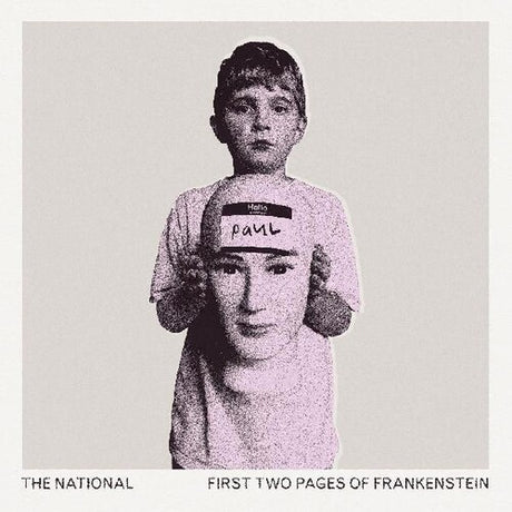 Album cover art for The National's First Two Pages of Frankenstein featuring a black and white photograph of a person holding a sign with the name 'Paul'.
