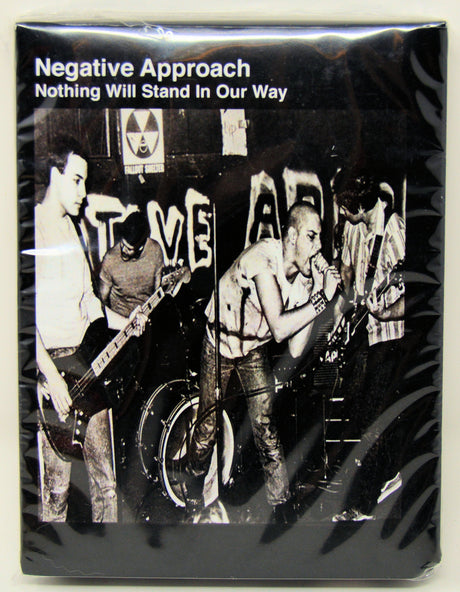 Front cover of Negative Approach's 'Nothing Will Stand In Our Way' featuring a live punk band performance
