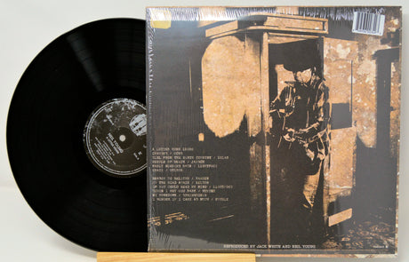 Back cover of Neil Young's 'A Letter Home' vinyl LP with track listing and artist illustration