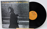 Vinyl record with cover featuring a person and text, on a white background