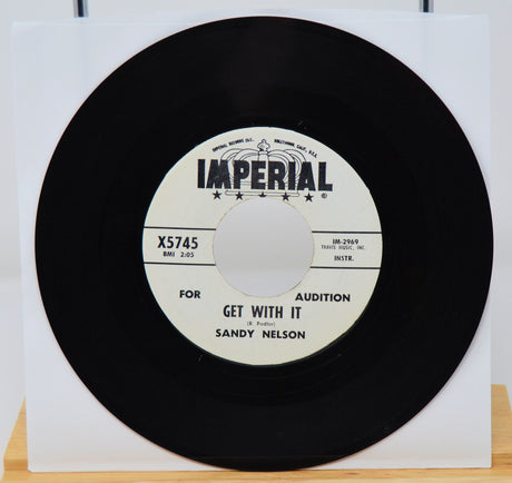 Vinyl record with Imperial label on a white background