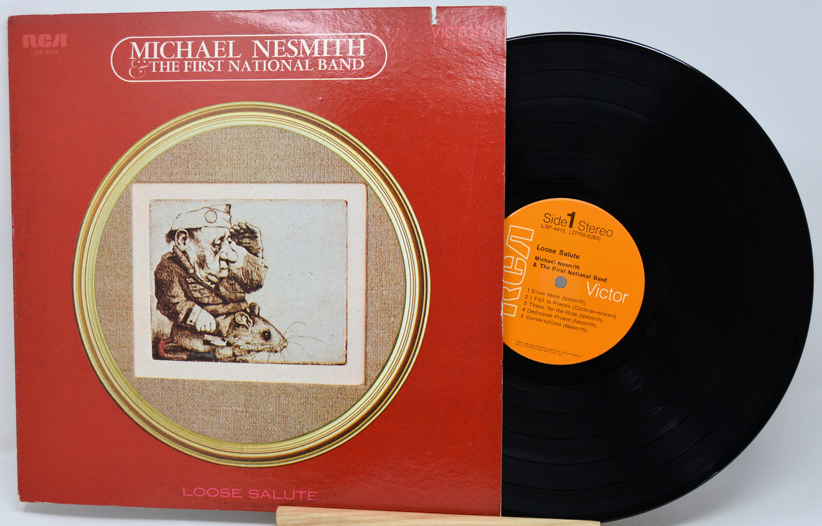 Michael Nesmith and The First National Band's 'Loose Salute' vinyl record album, showing the red cover with a circular artwork inset and the black record partially pulled out, with the orange Victor label visible.
