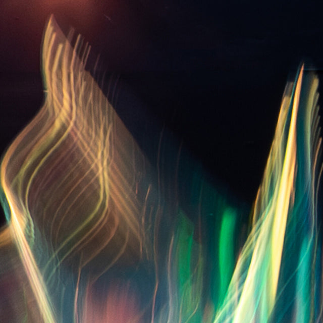 Abstract colorful light patterns on a dark background