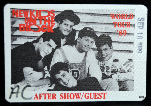 Backstage Pass for New Kids on the Block World Tour '89 featuring a group photo and event details.
