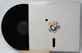 Vinyl record with a colorful logo on its cover