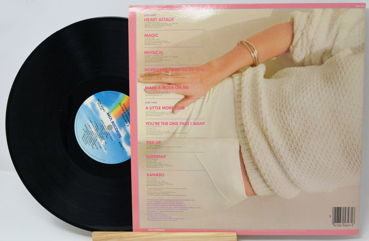 Vinyl record with a person wrapped in a blanket on the cover
