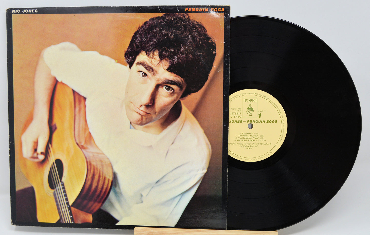 Front cover of Nic Jones Penguin Eggs vinyl LP with artist playing guitar