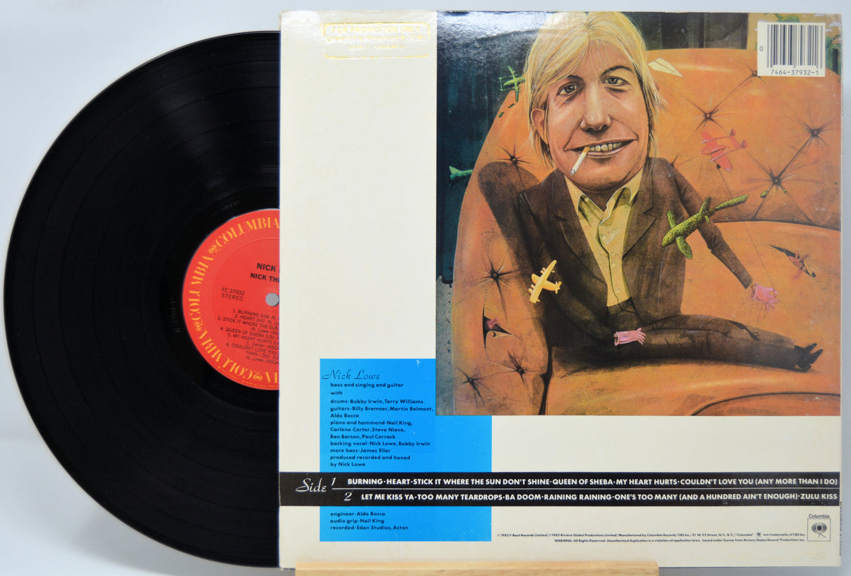 'Nick Lowe Nick The Knife' Vinyl record with its cover featuring a drawing of person smoking a cigarette.