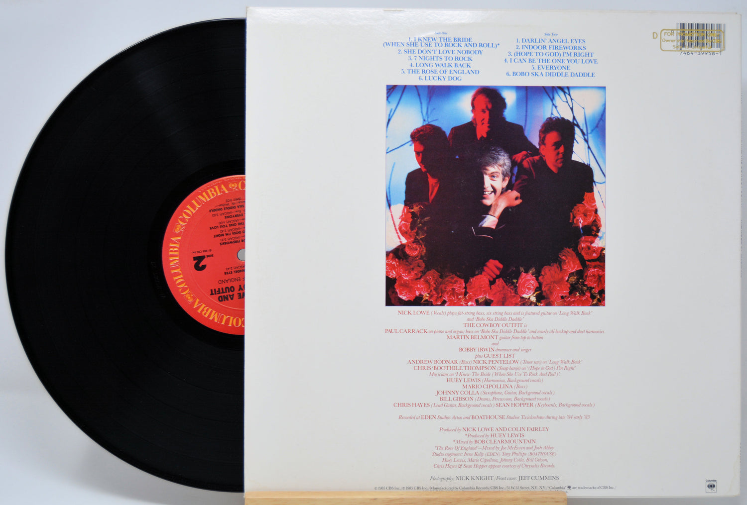 'Nick Lowe The Rose of England' Vinyl record with cover featuring a group of people and floral design