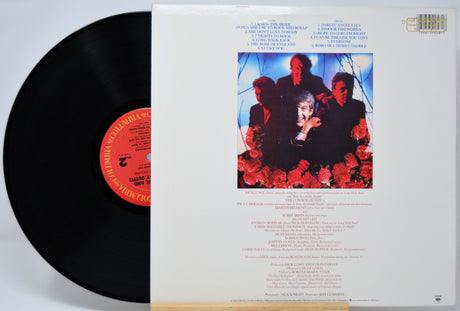 'Nick Lowe The Rose of England' Vinyl record with cover featuring a group of people and floral design