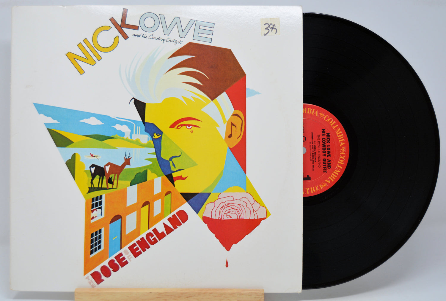 Vinyl record with a colorful cover featuring a stylized portrait and landscape, titled 'Rose England' by Nick Lowe.