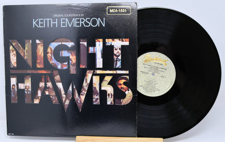 Vinyl record with a blue cover featuring four portraits and text