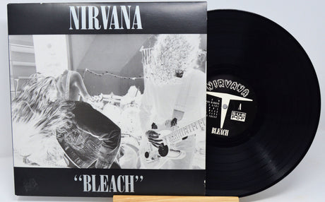Nirvana Bleach album front cover featuring band photo and vinyl