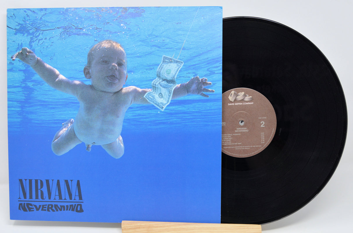 Vinyl record with 'Nevermind' album cover featuring a child underwater.