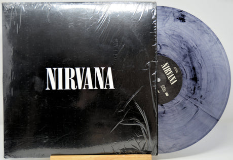 Vinyl record with 'Nirvana' branding and a black cover