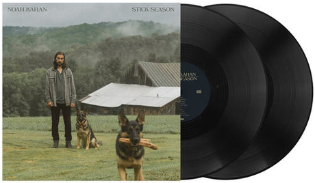 Vinyl records with a cover featuring a man and dogs in a field