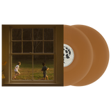 Vinyl records with a window view of two children playing outside.