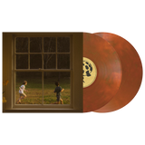 Vinyl records with a window view of two children playing outside.