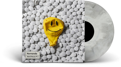 Vinyl record with a yellow smiley face balloon on a textured gray cover, featuring the brand 'Normandie'.