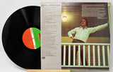 Back cover and vinyl record of 'Now Presenting Troy Seals' LP with song list and artist photo