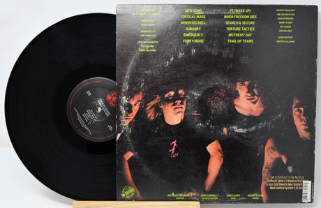 Vinyl record with a cover featuring a band's portrait on a white background